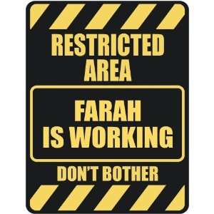   RESTRICTED AREA FARAH IS WORKING  PARKING SIGN