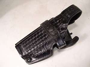   basket weave leather holster #070 383, 32 01 with Uncle Mikes belt