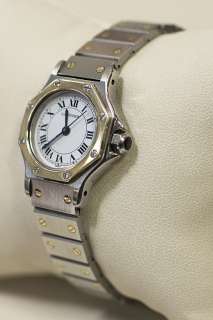 Ladies Santos Cartier 18k Gold and Stainless steel watch. This watch 