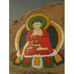com Tibetan Art Painted on a Rock at the Chinese Ethnic Cultural Park 