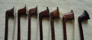You are bidding for 7 old violin bows.