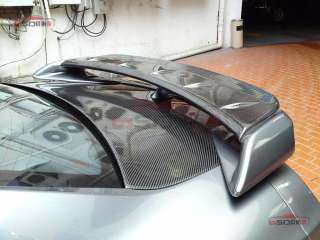THE TRUNK LIP SPOILER IS ADD ON TOP OF OEM TRUNK