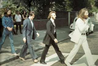 The Beatles as they Begin to Cross Abbey Road, 69  