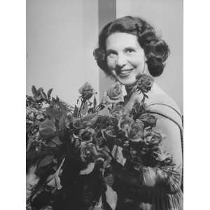 Singer Herta Glaz of the Metropolitan Opera Holding Flowers after a 
