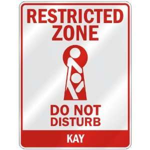   RESTRICTED ZONE DO NOT DISTURB KAY  PARKING SIGN