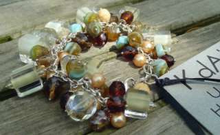 new with tag features pearls beads and hand torched furnace glass 