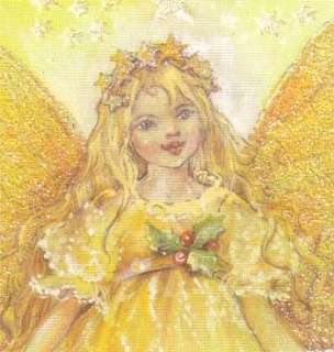 Christmas Tree Fairy, showing a fairy wearing gold standing at the top 
