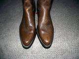 Hi up for auction is a pair of Vintage Texas Brand Cowboy boots 