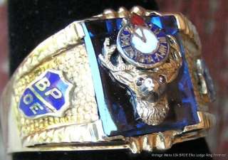   Gold Ring w 3 D Elks Head & Enamel Clock on Blue Spinel c1940s  