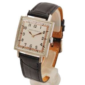  GIRARD PERREGAUX STAINLESS STEEL SQUARE MANUAL WIND MENS WATCH  