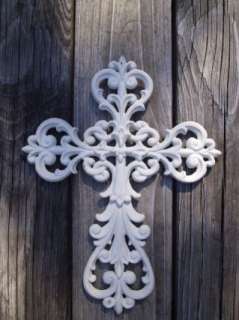 This listing is for 1 Large Ornate Cross. It has a rough off white 