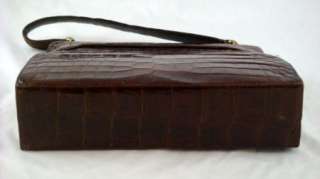   brown leather purse handbag designer label inside is worn and i