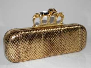 Gold snakeskin. Alexander McQueen signature hinged brass knuckle clasp 