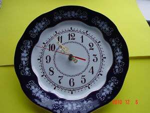 HUNGARIAN PORCELAIN WALL CLOCK it is HAND PAINTED and made in Hungary 