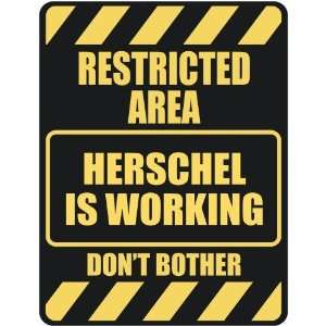   RESTRICTED AREA HERSCHEL IS WORKING  PARKING SIGN