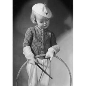  A Young Girl Ready to Bowl Her Hoop, Wrapped Up Warm in 