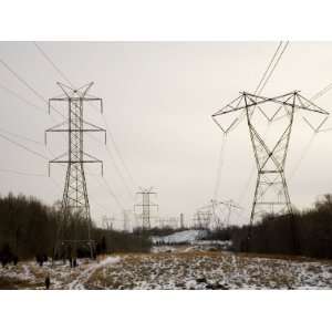  Powerline Towers Lead to the Distant Chimneys of the Power 