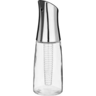 glass oil infuser has a chamber in the middle to place spices, garlic 