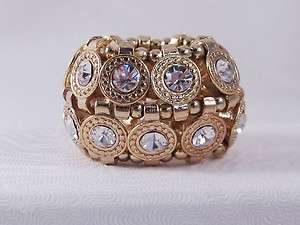 One New Fabulous Gold Tone Stretch Ring With Clear Crystals By  