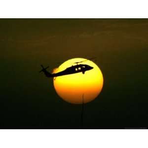  A US Military Helicopter Flies Over the Heavily Fortified 