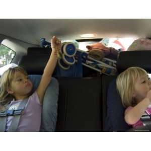  Kids Play During a Long Car Ride, Pittsburgh, Pennsylvania 