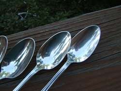 click to view image album offered are 4 silver plate teaspoons by 