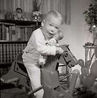 c1950 2x2 Negative cute kid riding Toy Rocking Horse